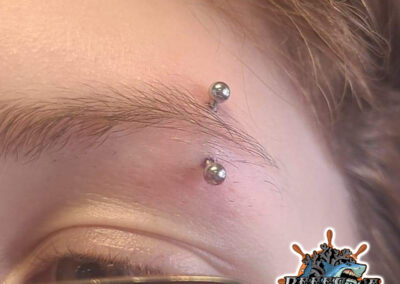 eye brow piercing