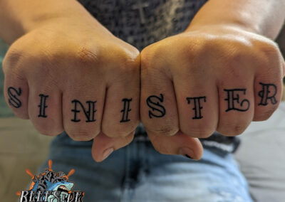 sinister knuckle tattoos